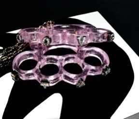 Love & Hate 2012 Size: Life-size knuckledusters Medium: Lost-wax cast pink glass, rhinestone crystals, metal, lacquer & wood